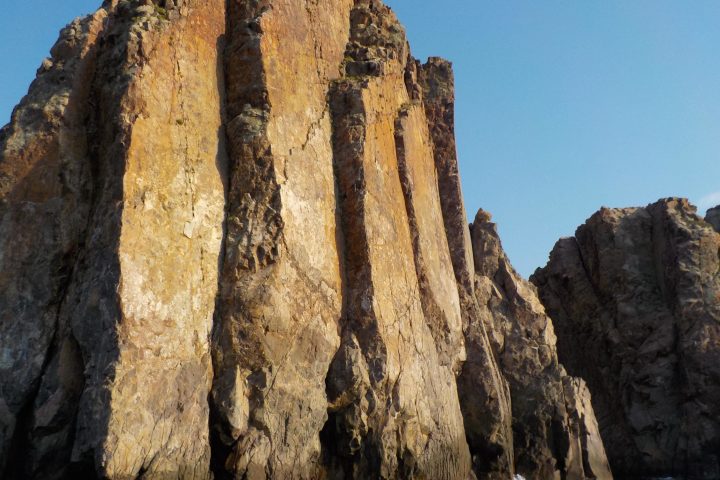 Cape Vani at the northeast entrance of the bay of Adamas in Milos