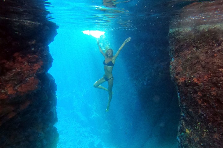 a man swimming in the water