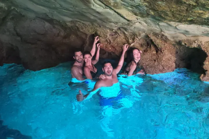 Photo in the blue cave in Kleftiko with an fluorescent color of water