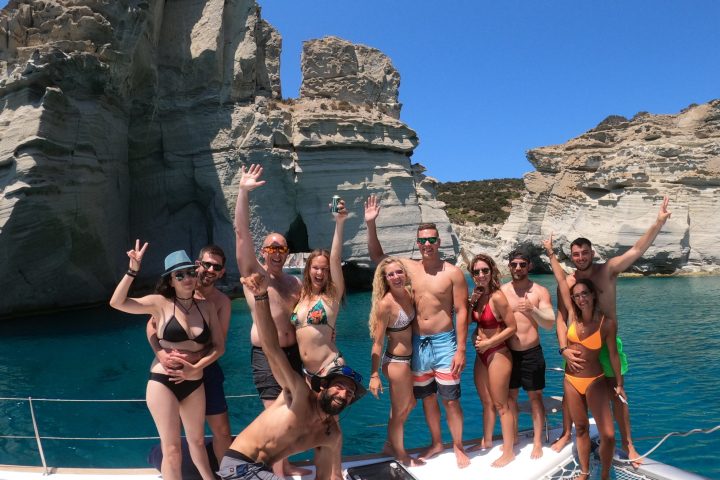 A group photo in front of the famous Kleftiko rock. We only take small groups of maximum 10 people on our catamaran cruises