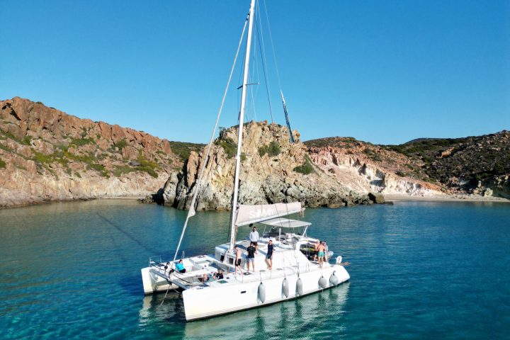 a small boat in a large body of water