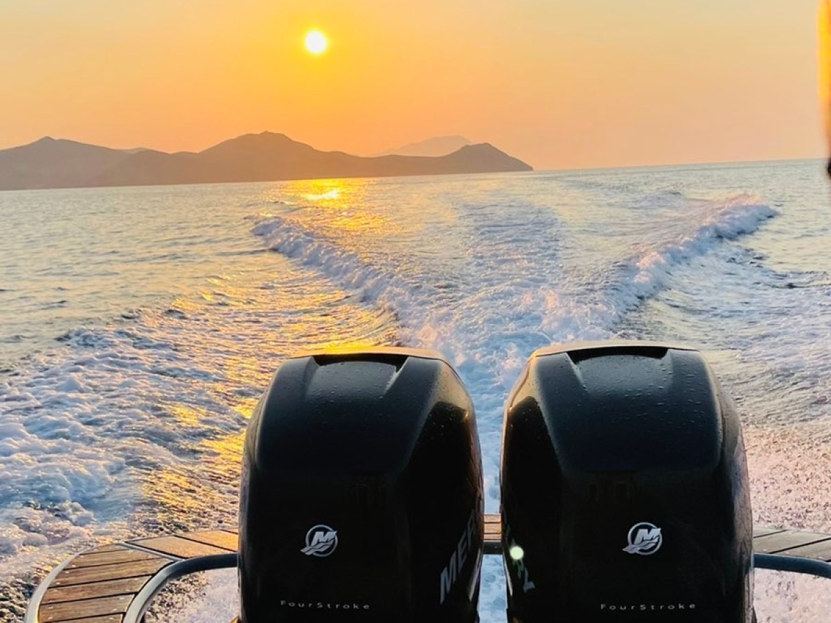 a sunset over a body of water