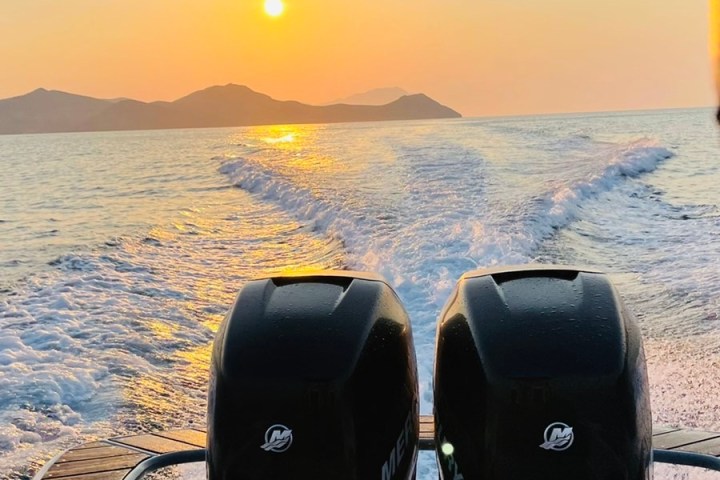 a sunset over a body of water