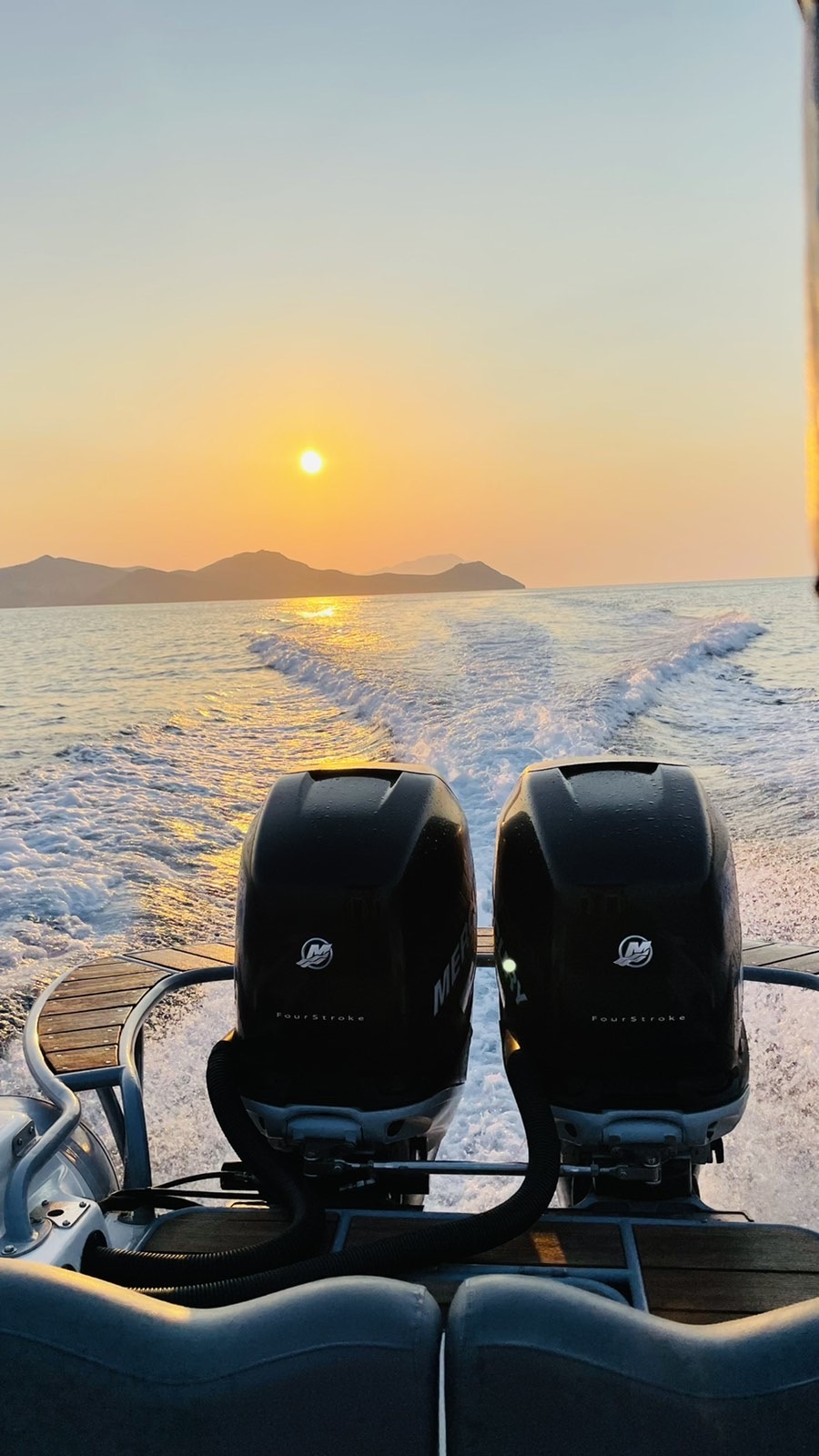 a sunset over a body of water