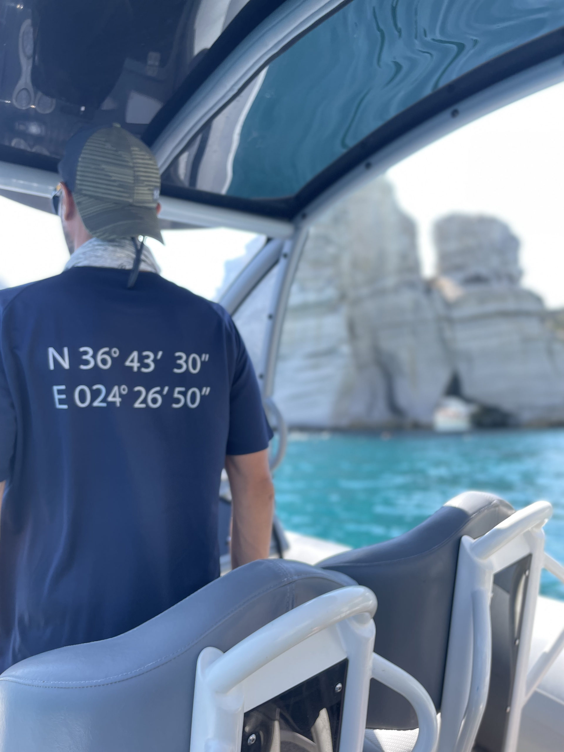 a man standing in front of a car