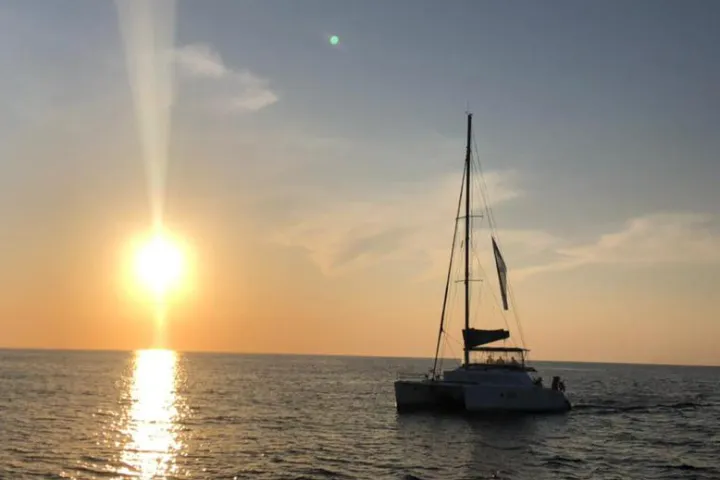 a small boat in a large body of water