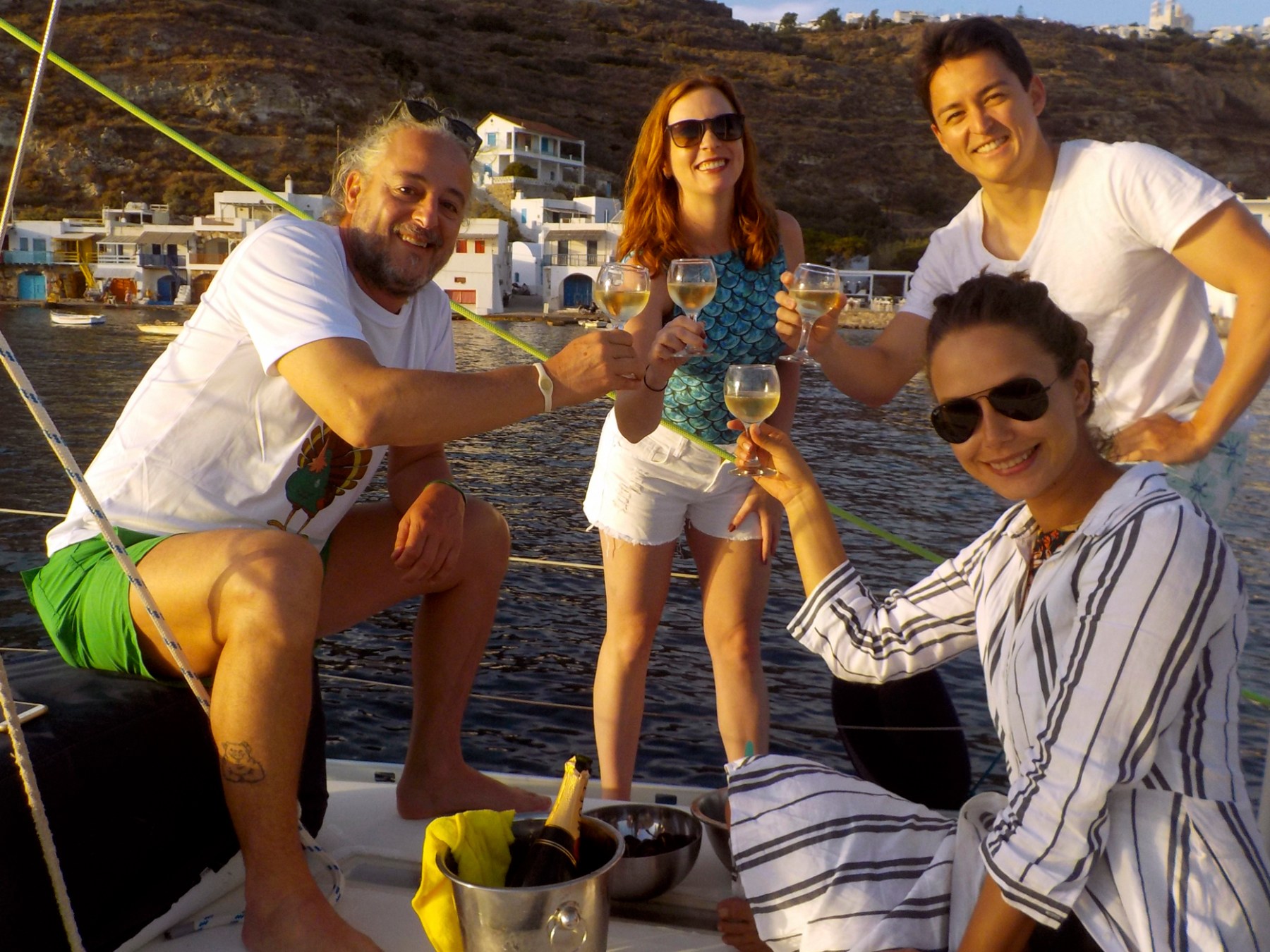 Enjoying a glass of champagne anchored in Klima