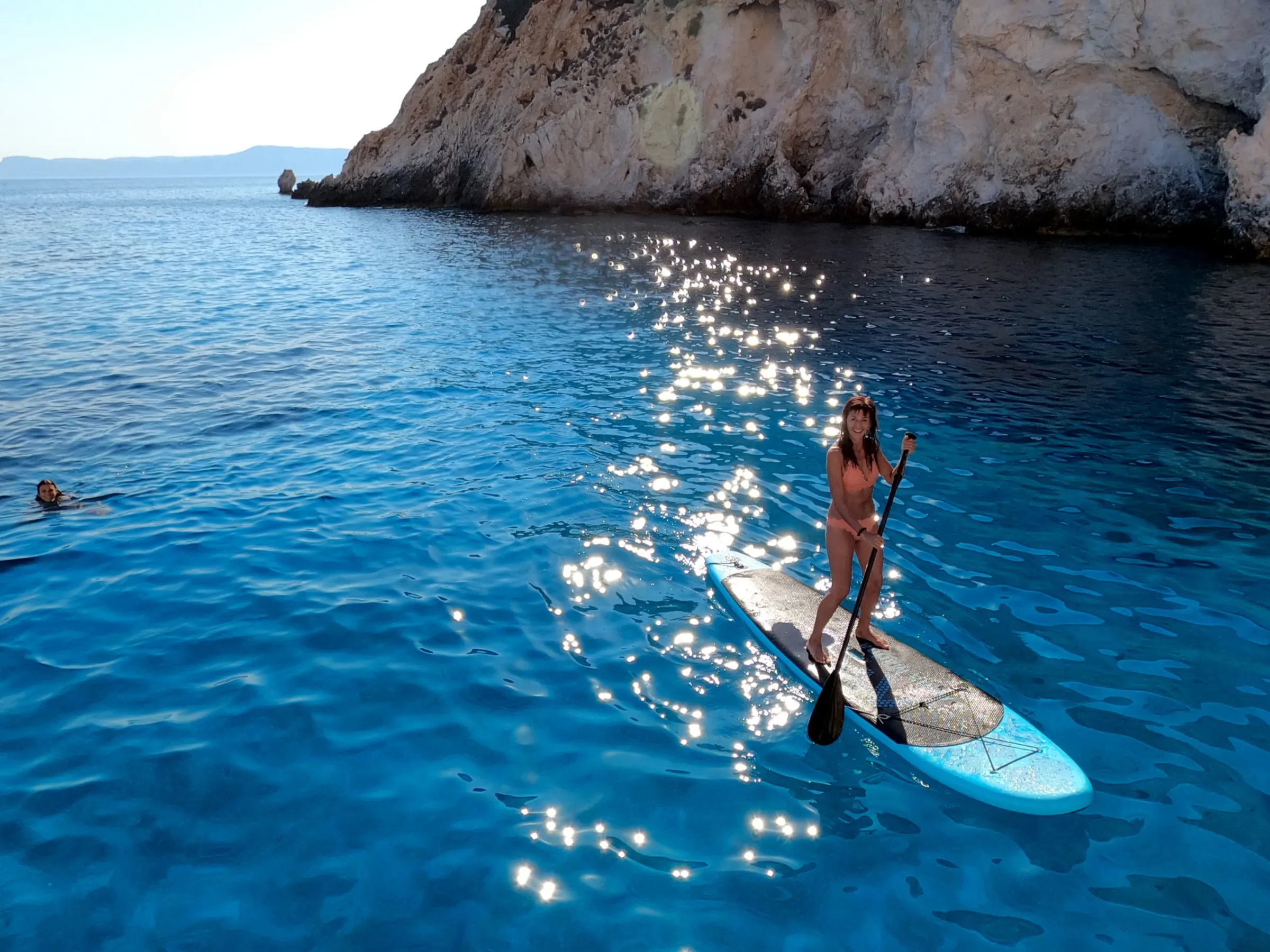 Stand-Up Paddling (SUP) is available if you come on our Round of Milos and Poliegos catamaran cruise
