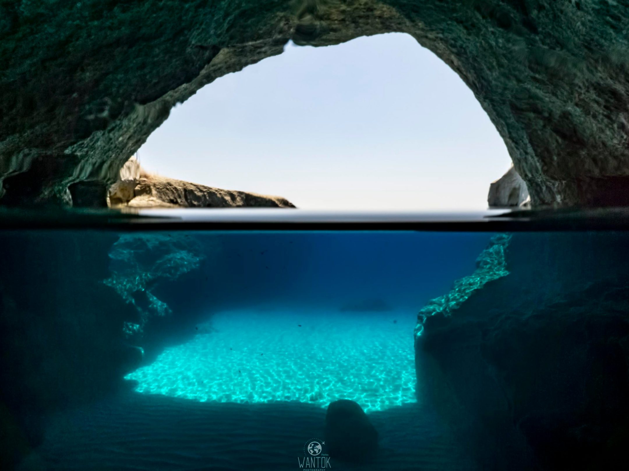 Exploring caves with our dinghy