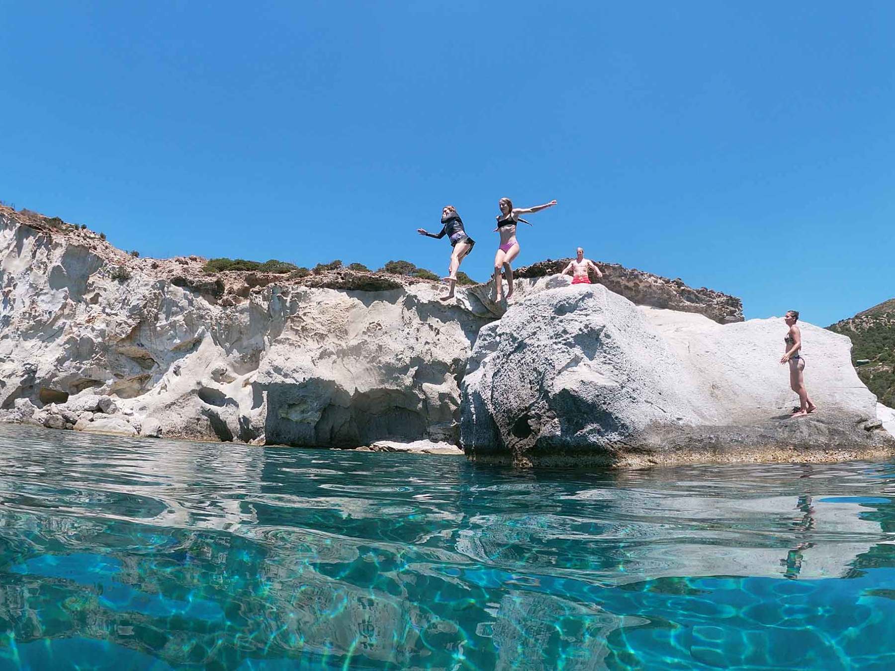 Rock jumping in Gerontas in Milos