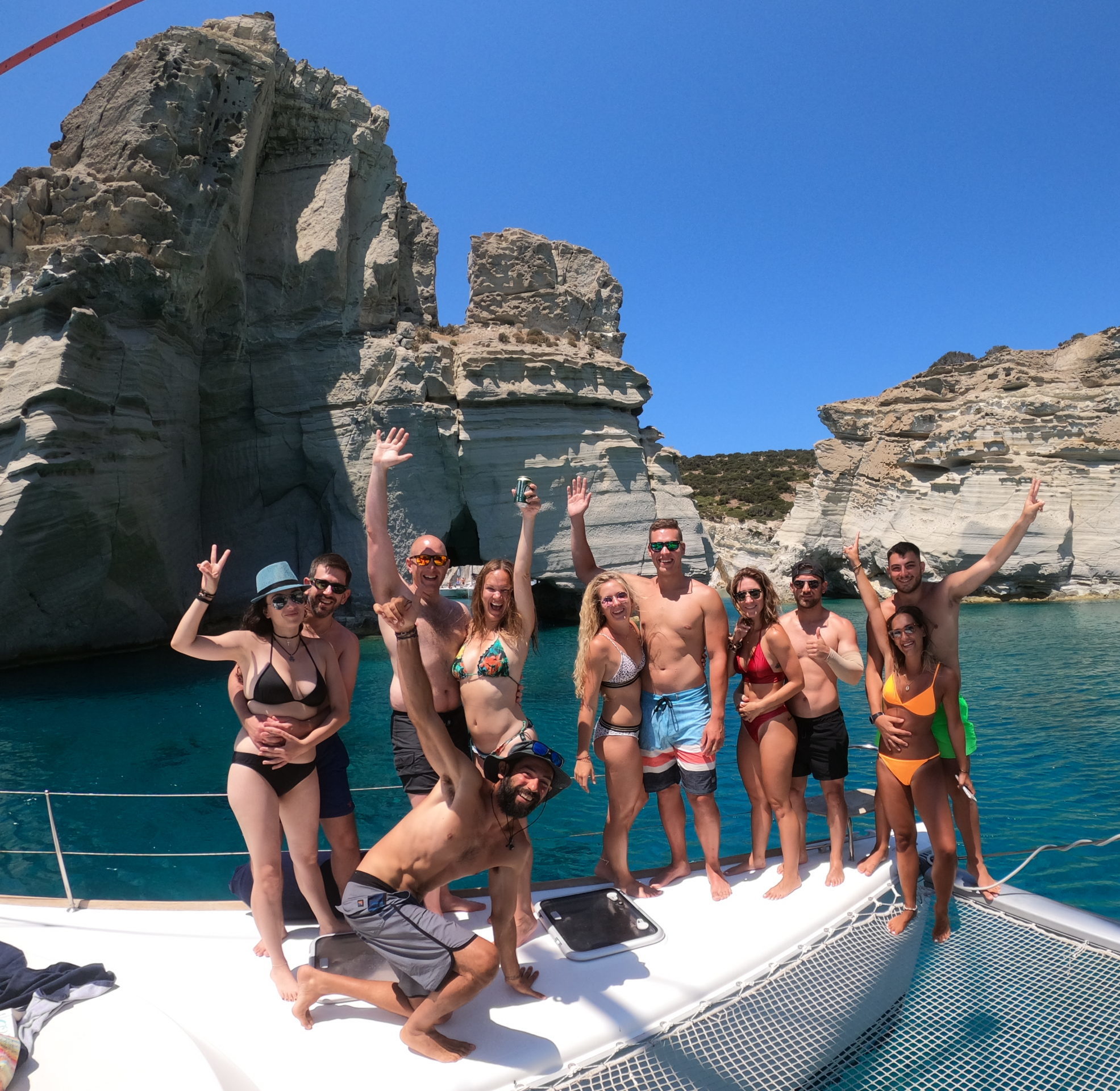 A group photo in front of the famous Kleftiko rock. We only take small groups of maximum 10 people on our catamaran cruises