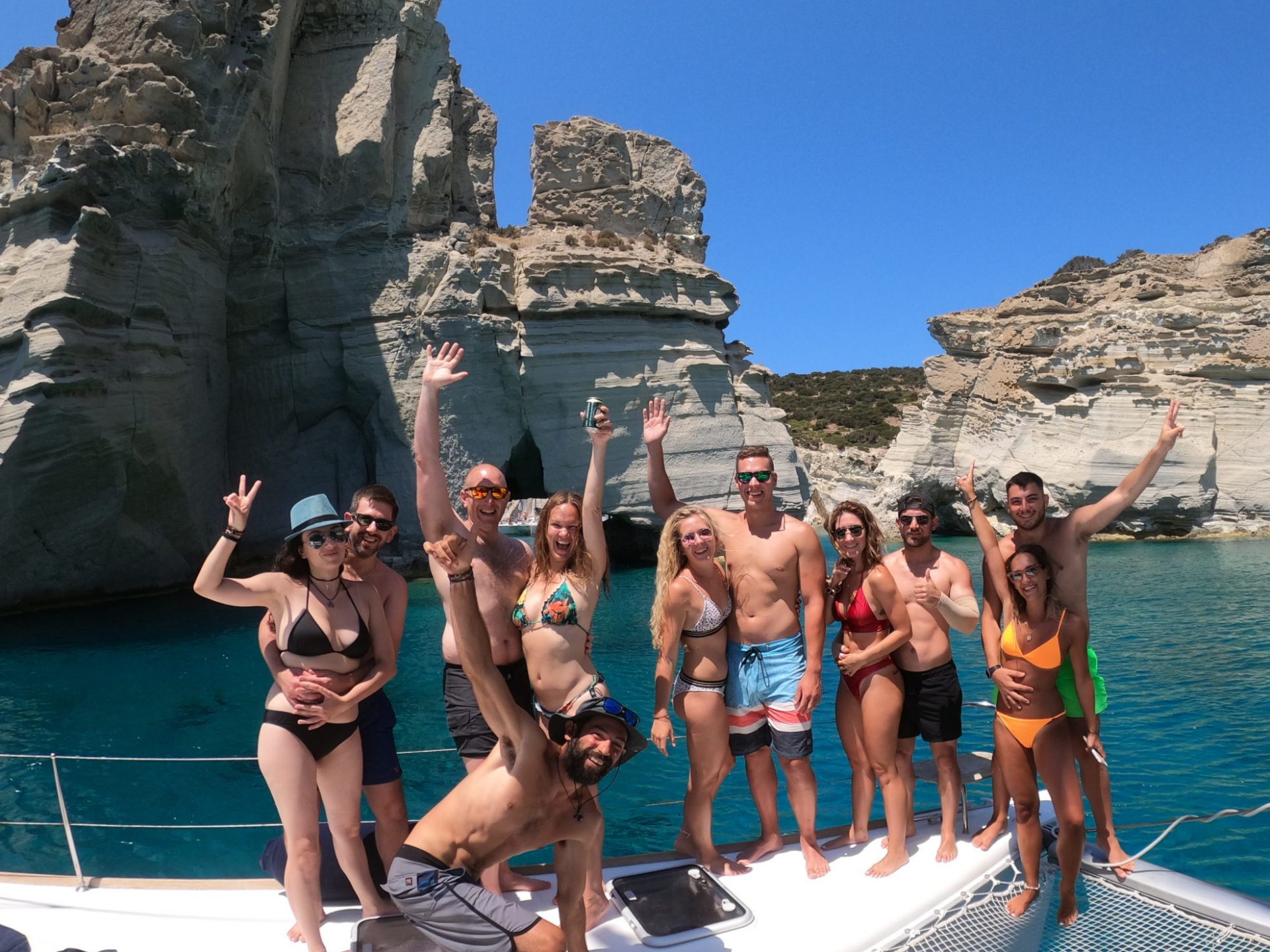 A group photo in front of the famous Kleftiko rock. We only take small groups of maximum 10 people on our catamaran cruises