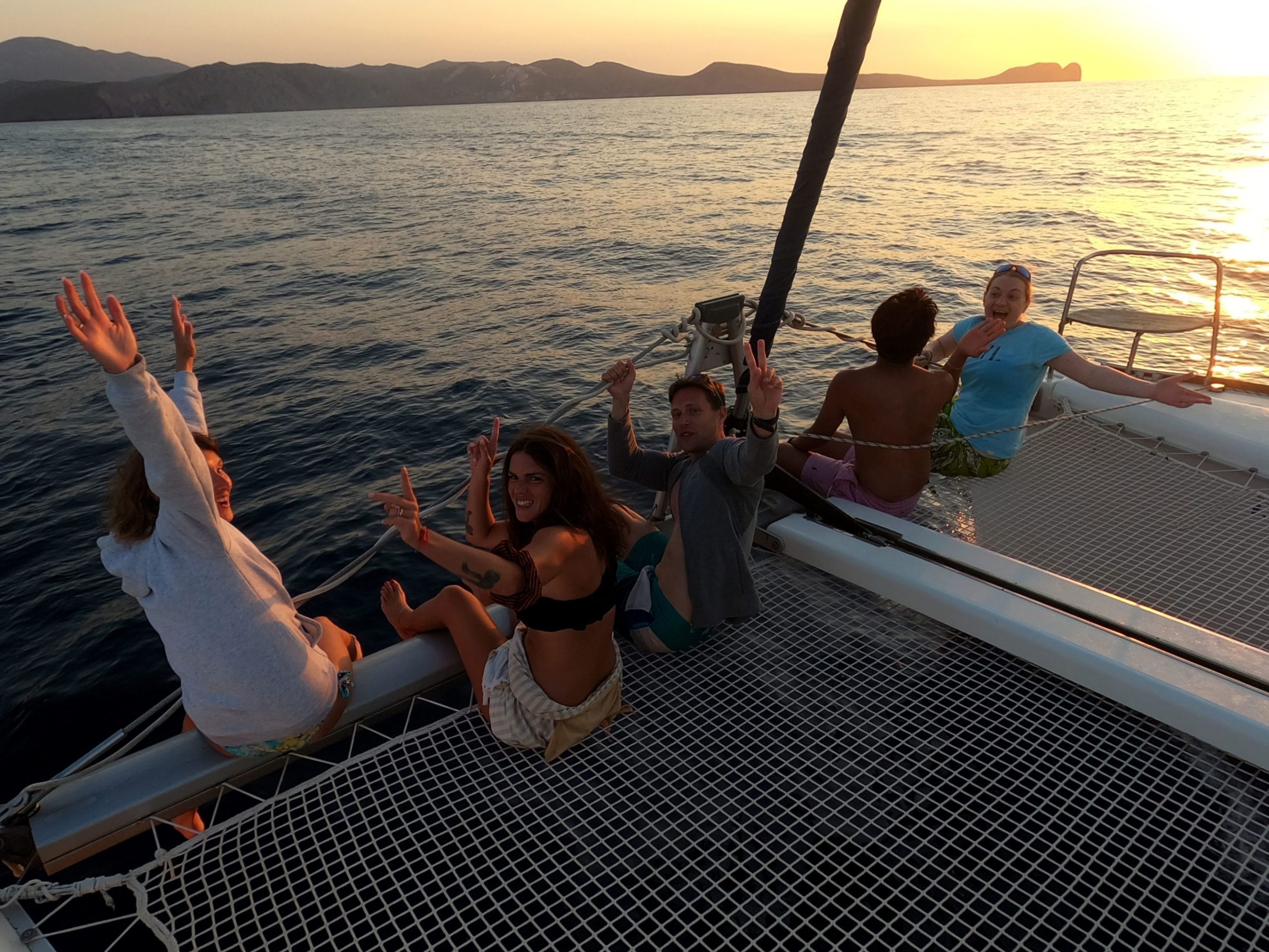 Having fun in the front of the catamaran