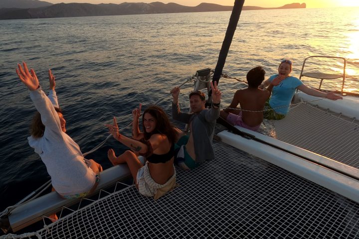 Having fun in the front of the catamaran