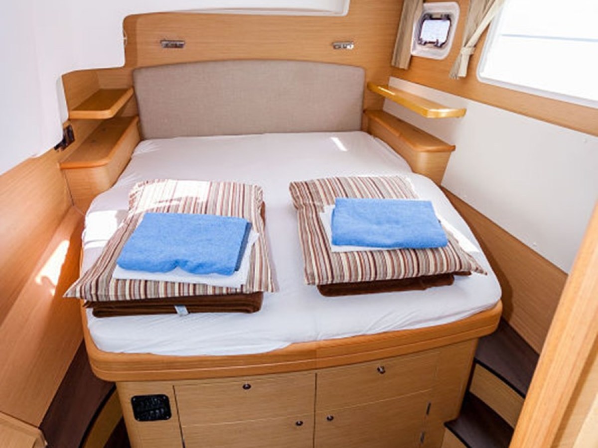 a bed with a wooden door